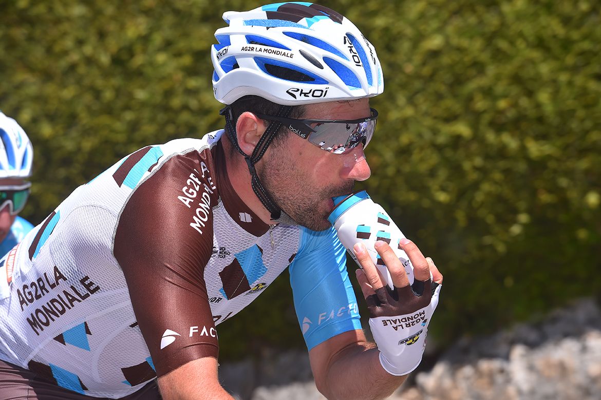 Julien Duval takes a feed on stage 6 of the Crit&eacute;rium du Dauphin&eacute;