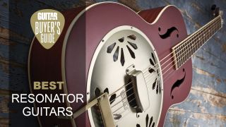 Close up of Gretsch resonator guitar on a blue wooden surface