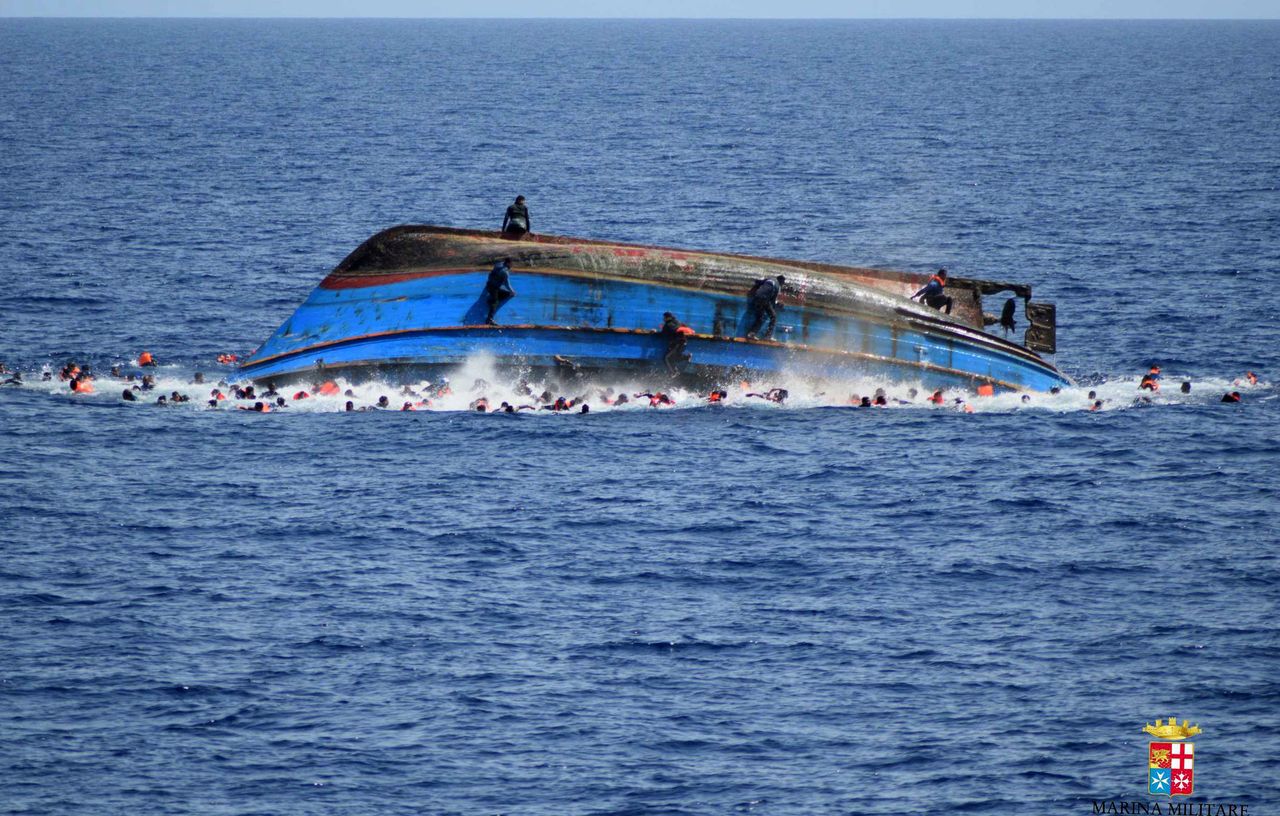 Migrant boat overturns off Libyan coast