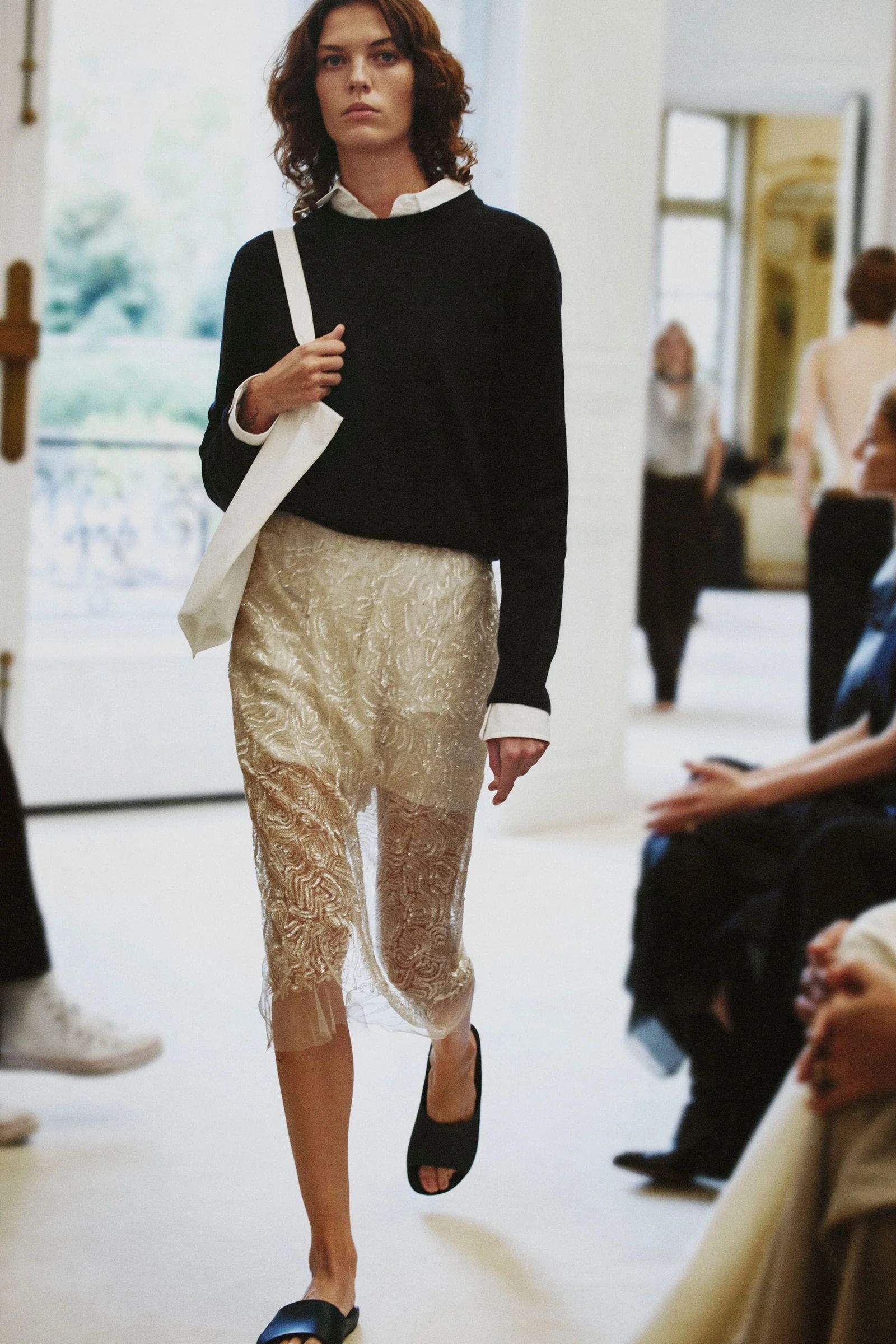 a model walks the The Row summer 2027 runway during Paris Fashion Week