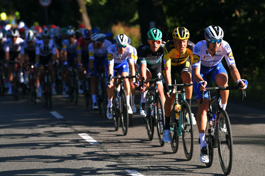 KATOWICE POLAND AUGUST 05 Mattia Cattaneo of Italy and Team Deceuninck QuickStep Taco Van Der Hoorn of The Netherlands and Team Jumbo Visma Maciej Bodnar of Poland and Team Bora Hansgrohe Peloton during the 77th Tour of Poland 2020 Stage 1 a 1958km stage from Silesian StadiumChorzw to SpodekKatowice TourdePologne tdp20 on August 05 2020 in Katowice Poland Photo by Luc ClaessenGetty Images
