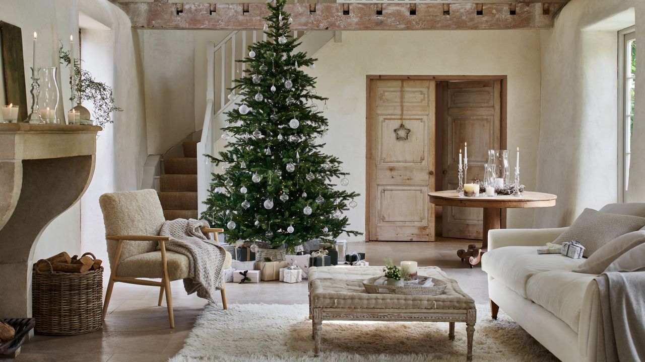 The White Company lifestyle shot of a Christmas living room beige