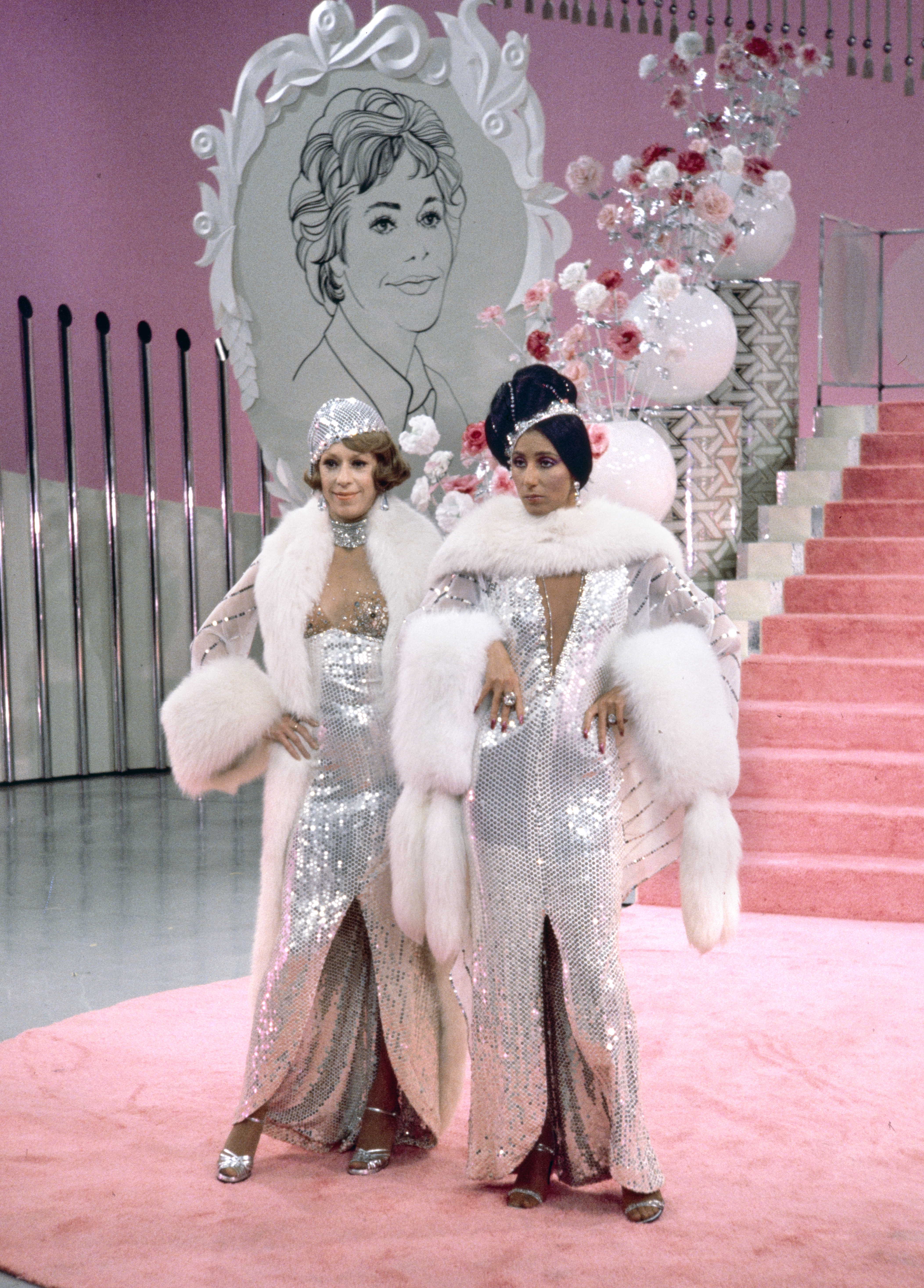 Carol Burnett (L) and Cher (R) on her solo music and variety show, CHER. Premiere episode aired February 16, 1975.