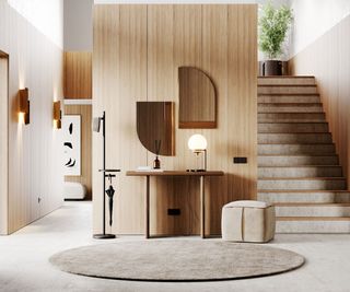 modern entryway with wooden wall paneling and concrete staircase