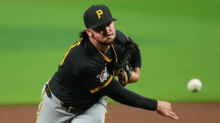 Paul Skenes of the Pittsburgh Pirates throwing during an MLB game