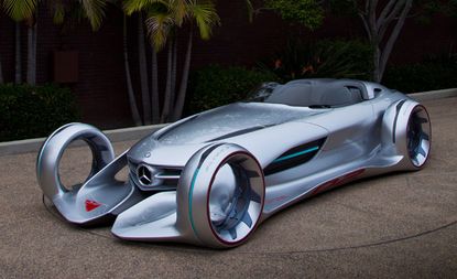 A two-seat, Mercedes Silver Arrow. Futuristic-looking car, with hub-less wheels.