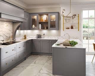 grey shaker U shaped kitchen with marble worktop