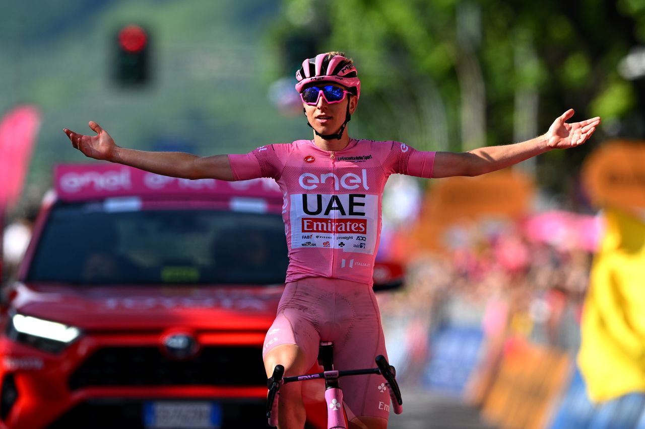 Tadej Pogačar celebrates his win on stage 20 of the Giro d&#039;Italia