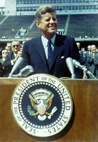 President Kennedy speaks before a crowd of 35,000 people at Rice University in the football field. The following are excerpts from his speech.
