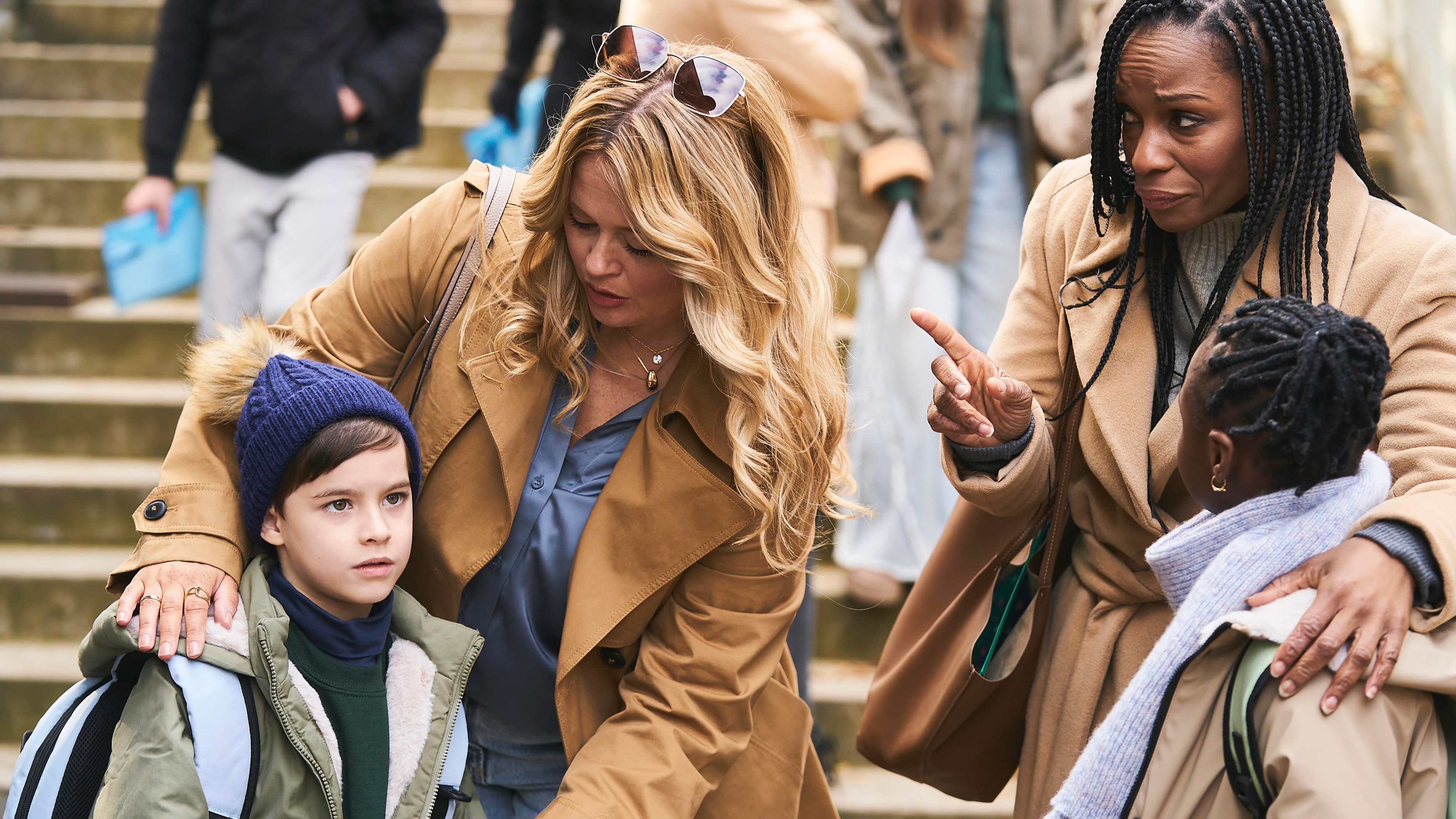 Emily Atack as Debbie getting her child ready to go into school in The Rumour