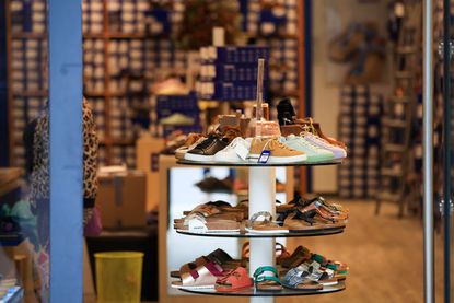 a display of Birkenstock footwear in store