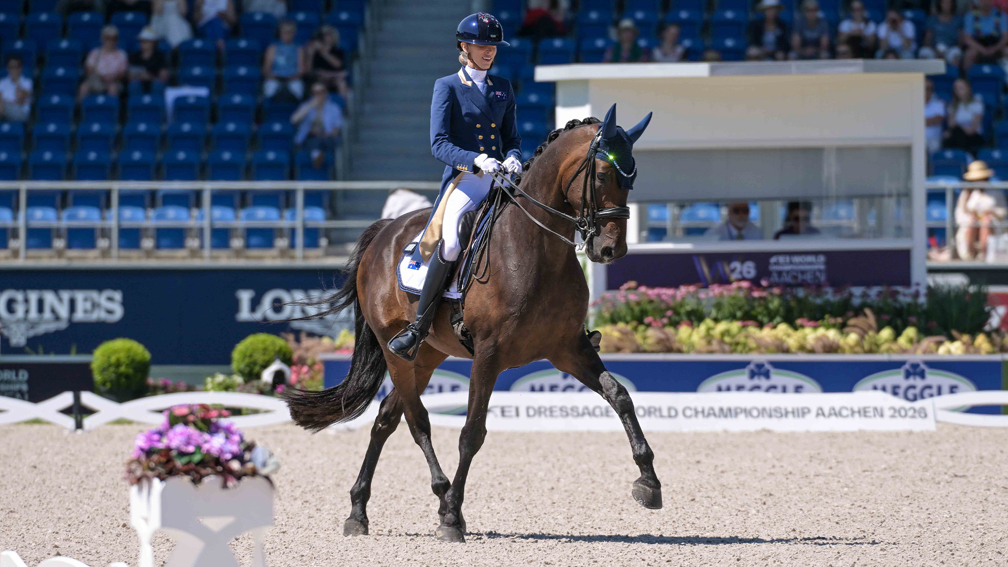 Simone Pearce riding bay horse at the FEI Dressage World Championships in Aachen