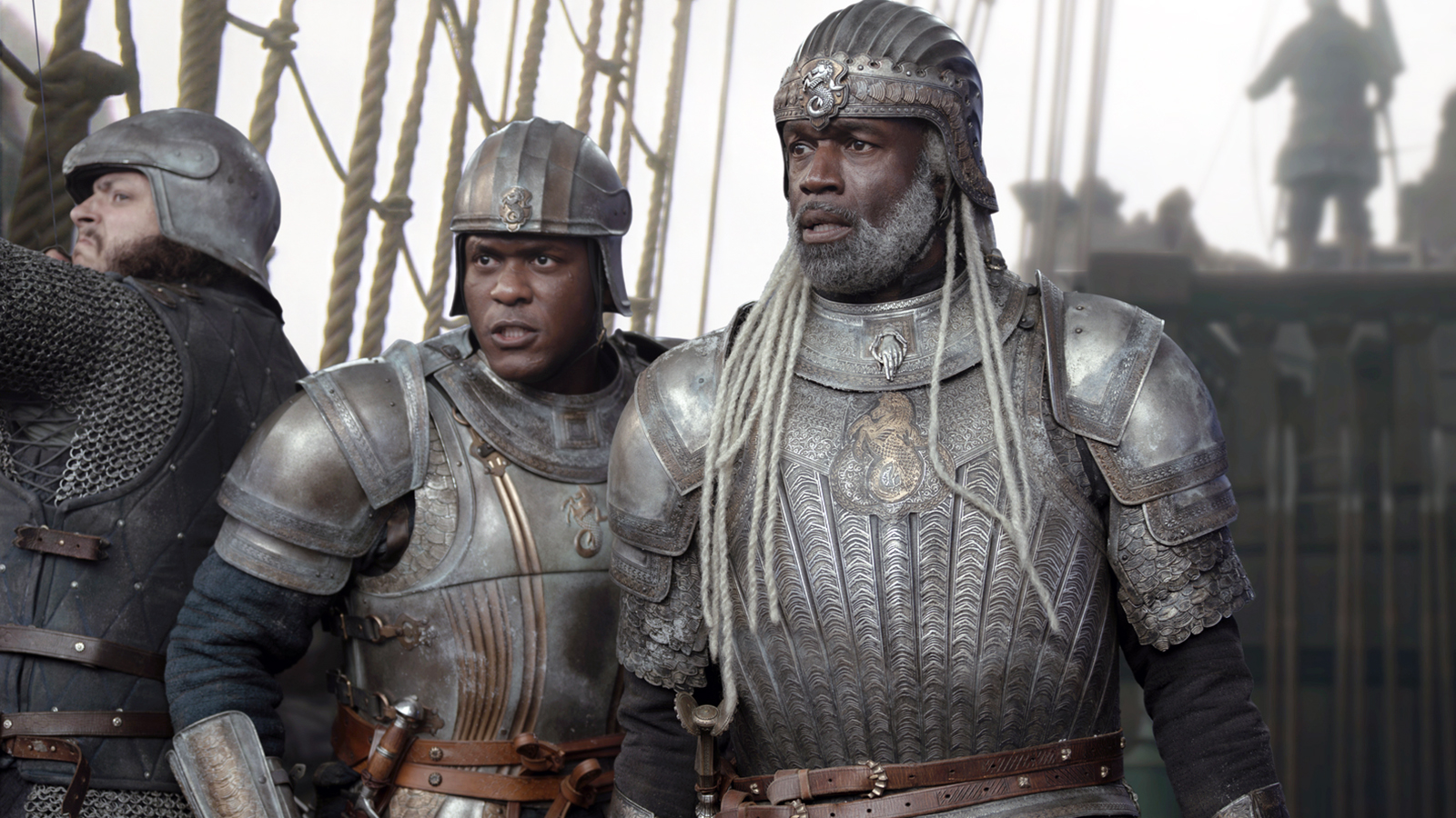 Alyn and Corlys staring at something off-camera while standing the deck of a ship in House of the Dragon season 3 episode 1