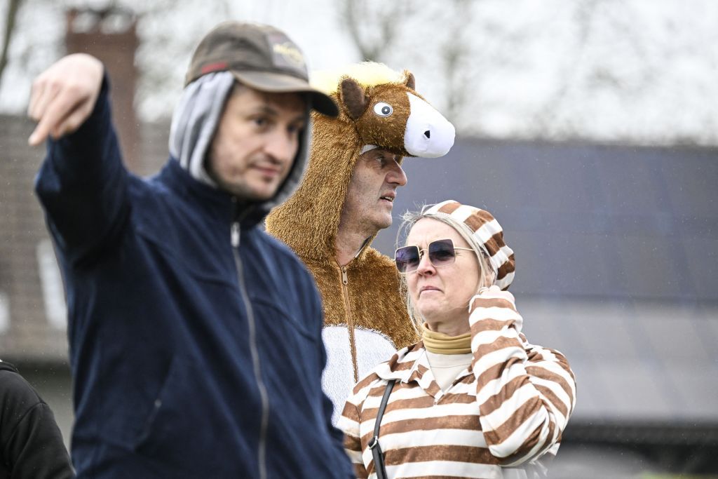 Dressed up cycling fans pictured at the Paterberg during the men's race of the 'Ronde van Vlaanderen/ Tour des Flandres/ Tour of Flanders' one day cycling event, 270,8km from Antwerp to Oudenaarde, Sunday 31 March 2024. BELGA PHOTO TOM GOYVAERTS (Photo by Tom Goyvaerts / BELGA MAG / Belga via AFP)