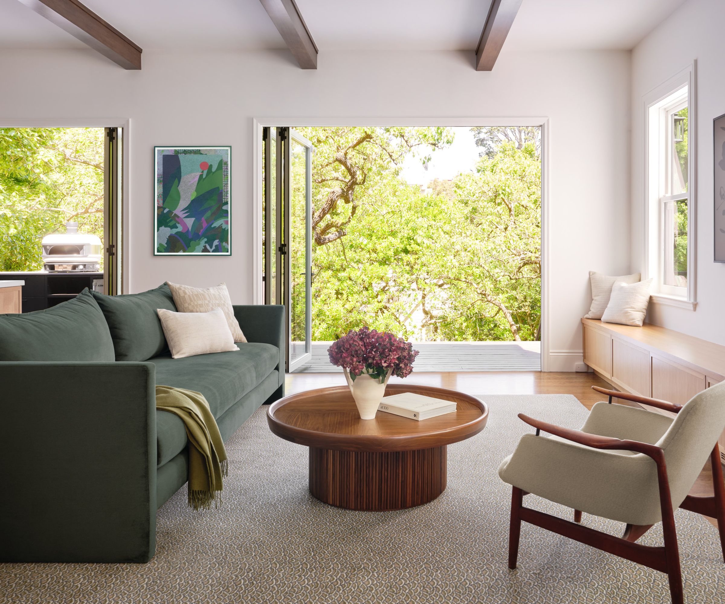 family room with picture windows green sofa