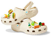Hidden Valley Ranch x Crocs, $69.99 | Crocs
Dip your feet into these sauce-inspired shoes designed by streetwear brand The Hundreds. The Classic-Clog-inspired shoe features an off-white base color, green speckles, and food-inspired charms to personalize the shoes with.