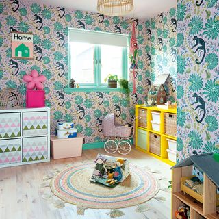 colourful bedroom with wallpaper and toy storage