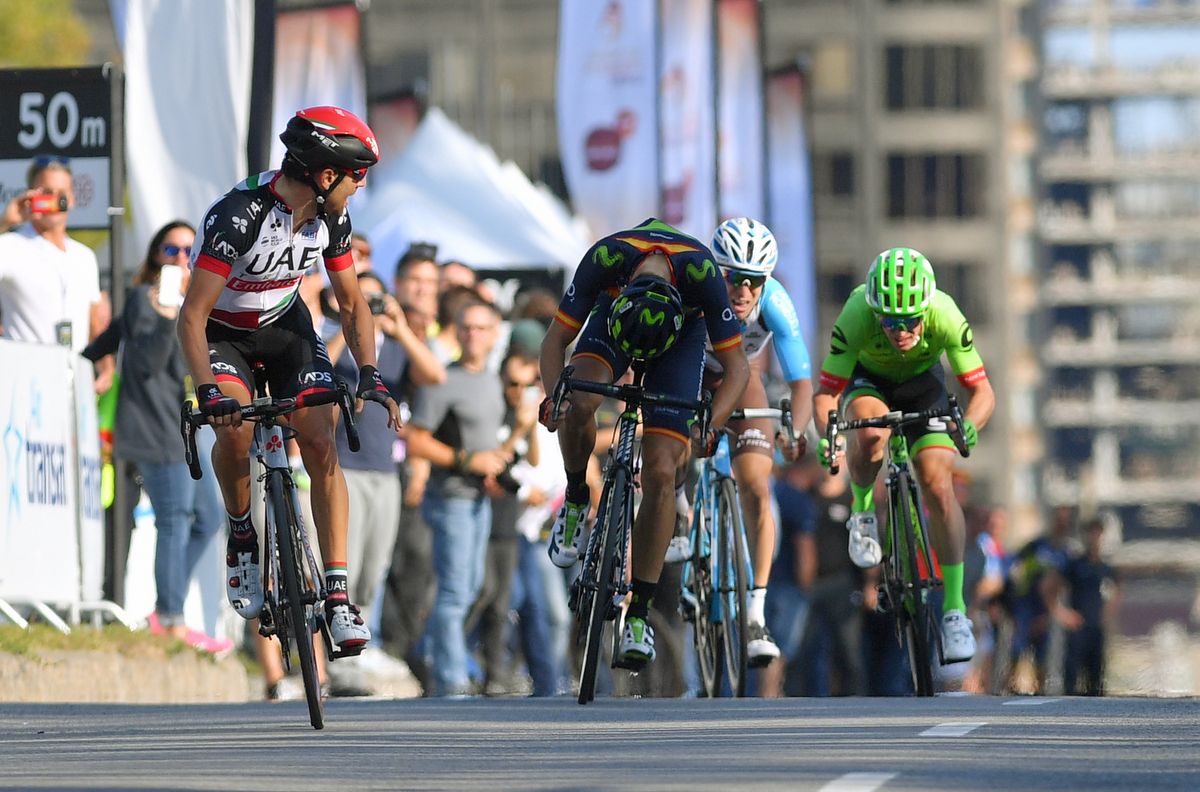 Diego Ulissi (UAE Emirates) checks he's safe before celebrating