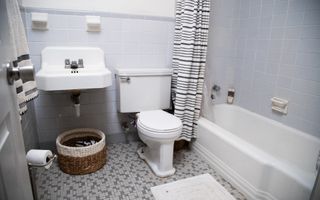 dated bathroom with tile