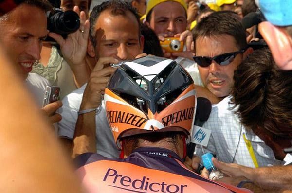 Cadel Evans went straight from an all out effort into the scrum of the press