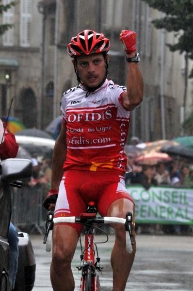 Cofidis' Mickael Buffaz celebrates the win in St Leonard de Noblat.