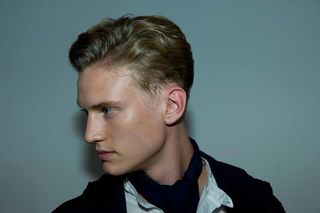 Side profile view of male model