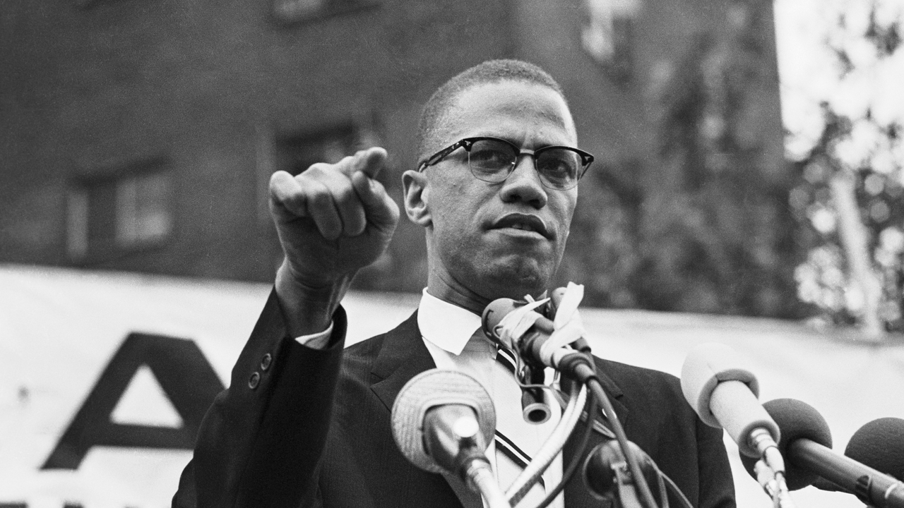 Malcolm X speaking at a rally