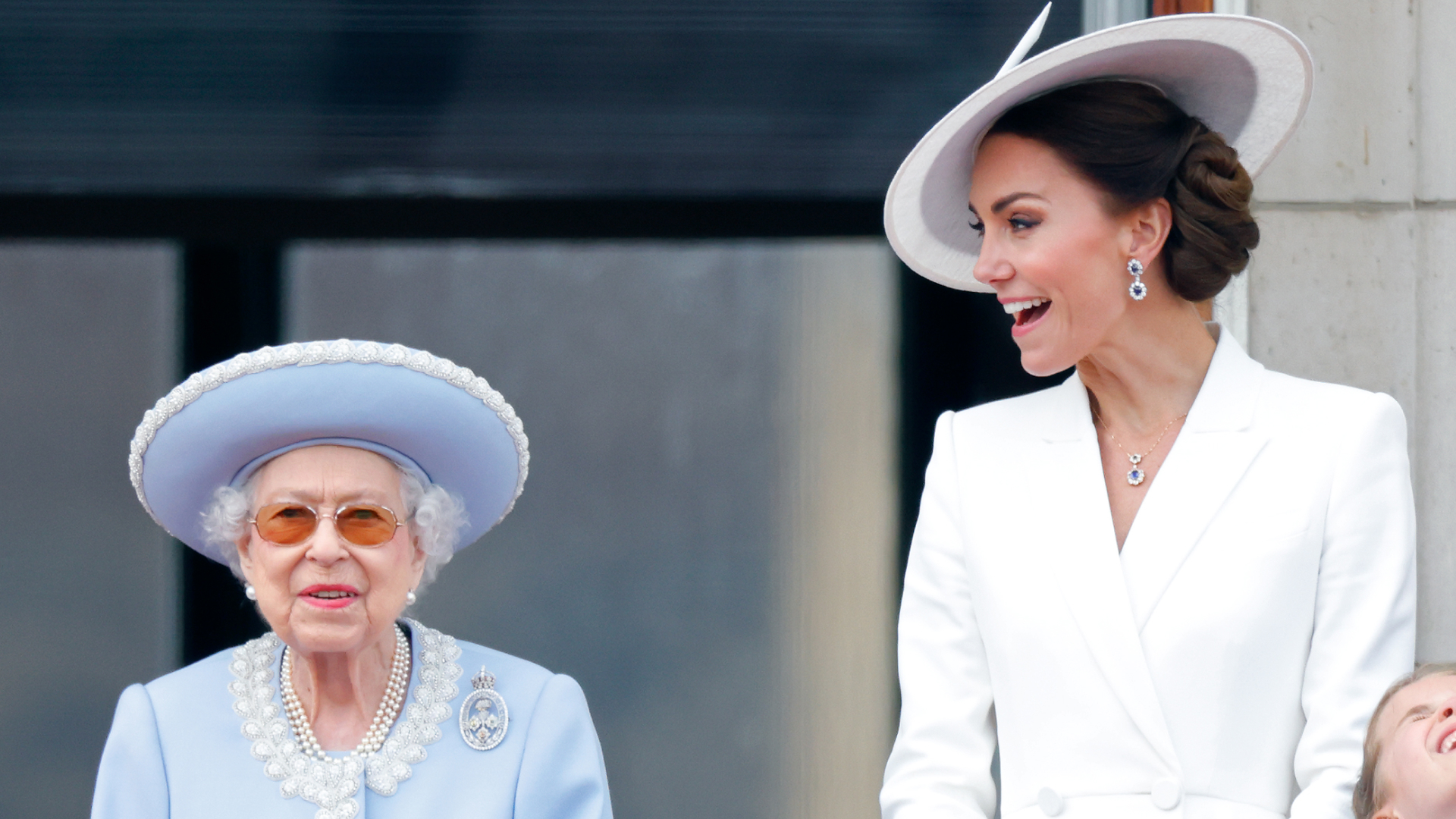 Queen Elizabeth and Kate Middleton watch a flypast from the balcony of Buckingham Palace during Trooping the Colour on June 2, 2022 in London, England