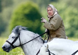 Queen Elizabeth II riding a horse at Windsor