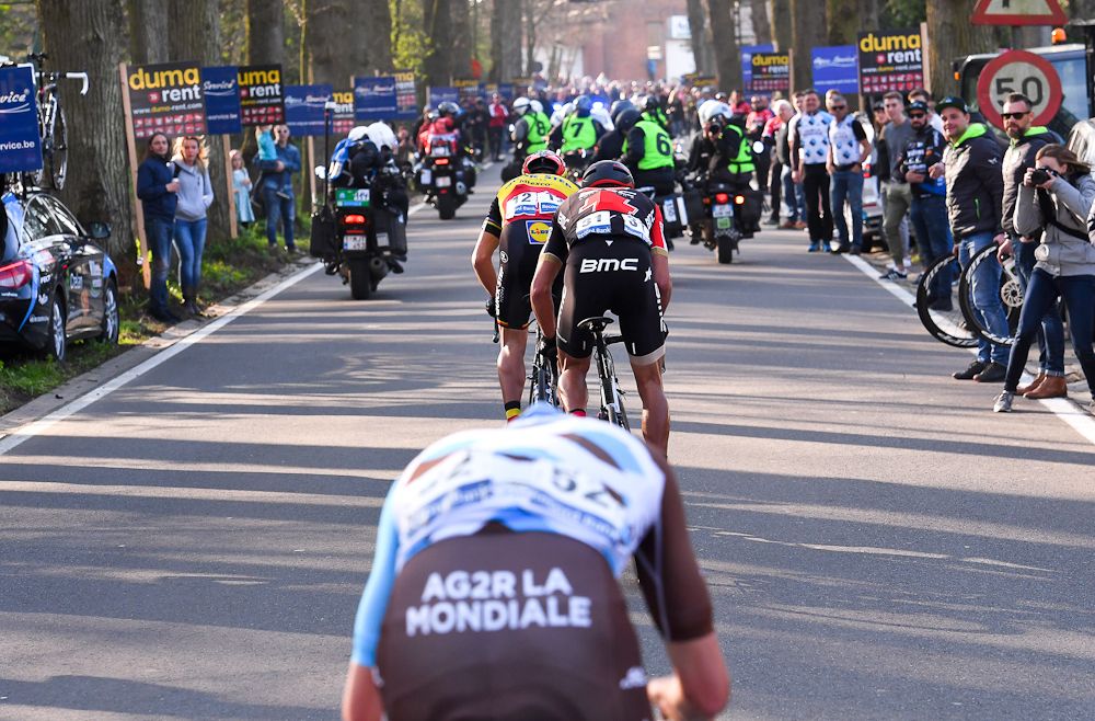 Oliver Naesen fights to regain the wheels of Greg van Avermat and Philippe Gilbert near the end of the 2017 E3 Harelbeke
