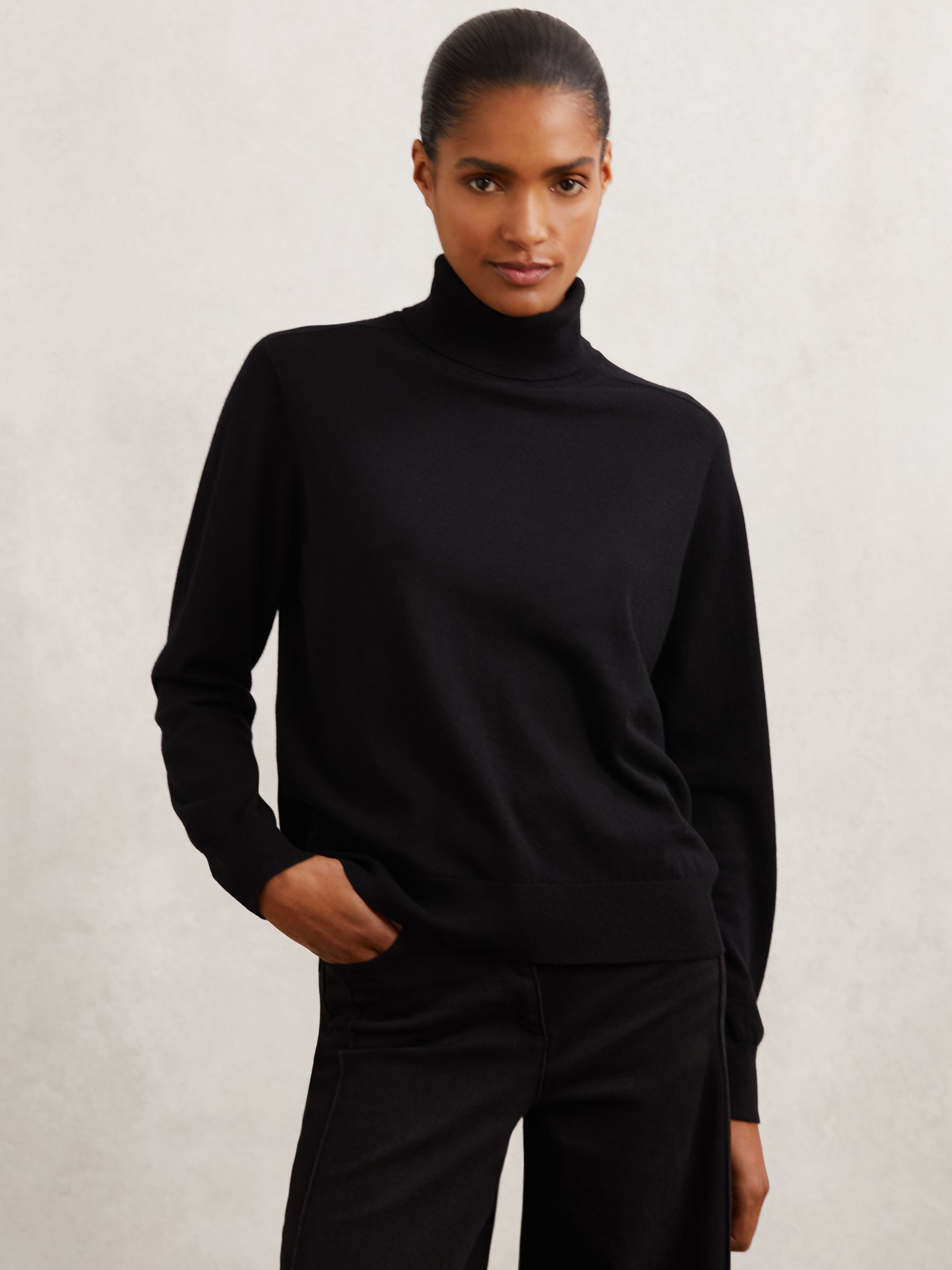 Wool Roll-Neck Jumper in Black