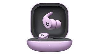 Beats Fit Pro true wireless earbuds in lilac, the best workout headphones, in their charging case against a white background