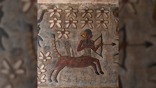 This zodiac sign depicts Sagittarius. While the zodiac signs at Esna were known before cleaning was done the work allows them to be seen more clearly. Here we see a centaur with a scorpion&#039;s tail aiming a bow and arrow.