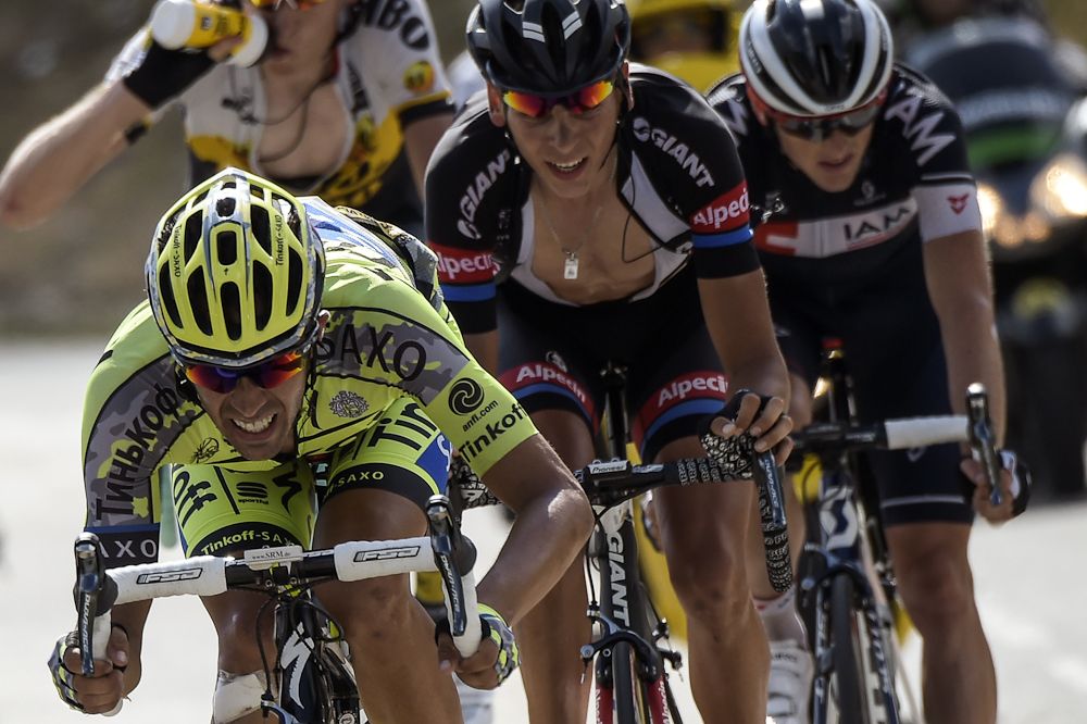 Alberto Contadpr leads Warren Barguil on a descent.