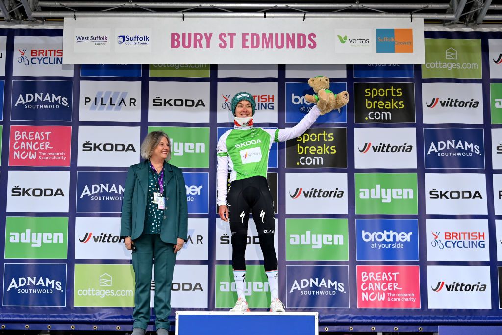 BURY ST EDMUNDS ENGLAND JUNE 06 Christine Majerus of Luxembourg and Team SD Worx celebrates winning the green queen of the mountains jersey on the podium ceremony after the 8th The Womens Tour 2022 Stage 1 from Colchester to Bury St Edmunds WomensTour UCIWWT on June 06 2022 in Bury St Edmunds England Photo by Justin SetterfieldGetty Images