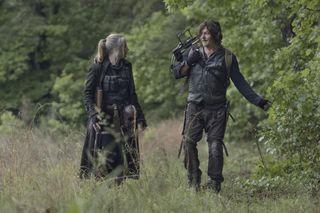 Lynn Collins and Norman Reedus in The Walking Dead