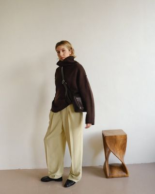 @brittanybathgate wearing loafers with trousers and jumper