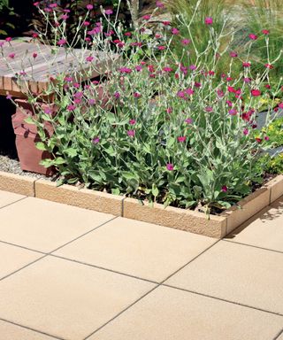 textured buff paving with matching edging from Bradstone