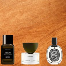 Three sandalwood fragrances in front of a wood. background