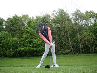 Golf Monthly Alex Elliott demonstrating the driver impact position during the downswing