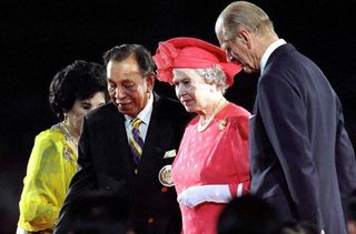 queen wore hat backwards surprising reason