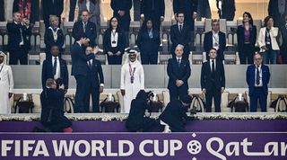 (From C, L-R) The president of the Qatar Football Association Hamad Bin Khalifa Bin Ahmed Al-Thani, FIFA President Gianni Infantino, French President Emmanuel Macron and the president of the French Football Federation, Noël Le Graët, wait for the start of the Qatar 2022 World Cup semi-final football match between France and Morocco at the Al-Bayt Stadium in Al Khor, north of Doha on December 14, 2022. (Photo by GABRIEL BOUYS / AFP) (Photo by GABRIEL BOUYS/AFP via Getty Images)