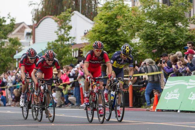 Thor Hushovd (BMC) crosses the line first ahead of Michael Rogers (Saxo-Tinkoff) and Tejay van Garderen (BMC) at the final intermediate sprint line