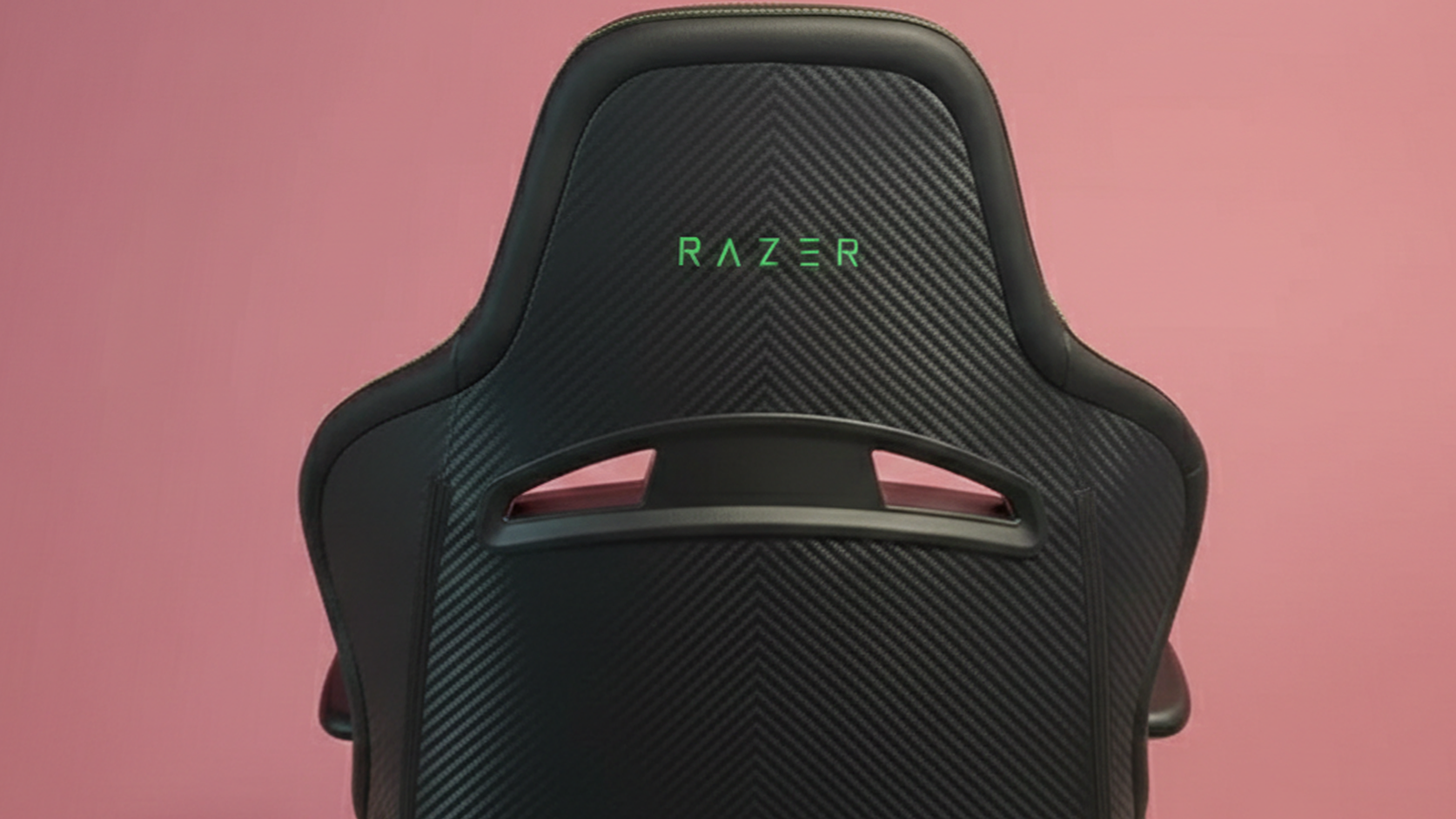 The Razer Enki Pro gaming chair in a colorful gaming and office set-up.