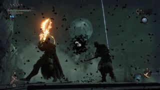 A dark warrior with a flaming sword in Lords of the Fallen.