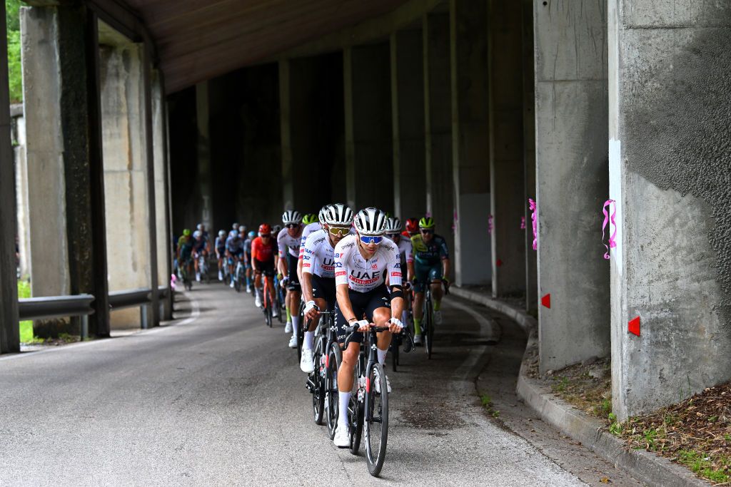 SAPPADA ITALY MAY 24 Rui Oliveira of Portugal and UAE Team Emirates with teammates leadthe peloton passing a tunnel during the 107th Giro dItalia 2024 Stage 19 a 157km stage from Mortegliano to Sappada 1236m UCIWT on May 24 2024 in Sappada Italy Photo by Dario BelingheriGetty Images