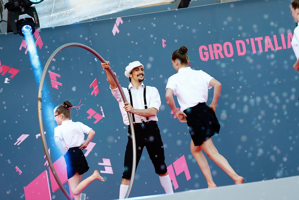 Dancers on stage at the Giro team presentation.