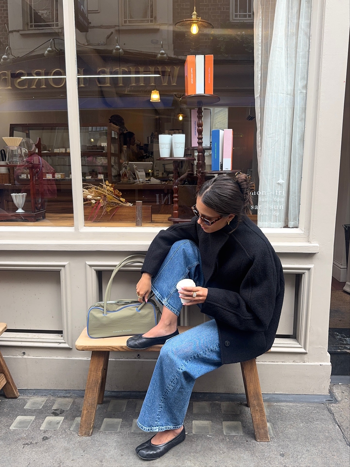 Fashion person Tia Dewitt wears a winter jean outfit 2025.