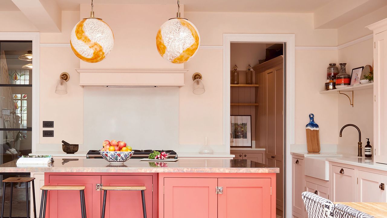 Olive and Barr pink kitchen with pendant lights