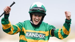 British Jockey Rachael Blackmore celebrates ahead of the 2023 Randox Grand National Handicap Chase at Aintree Racecourse.